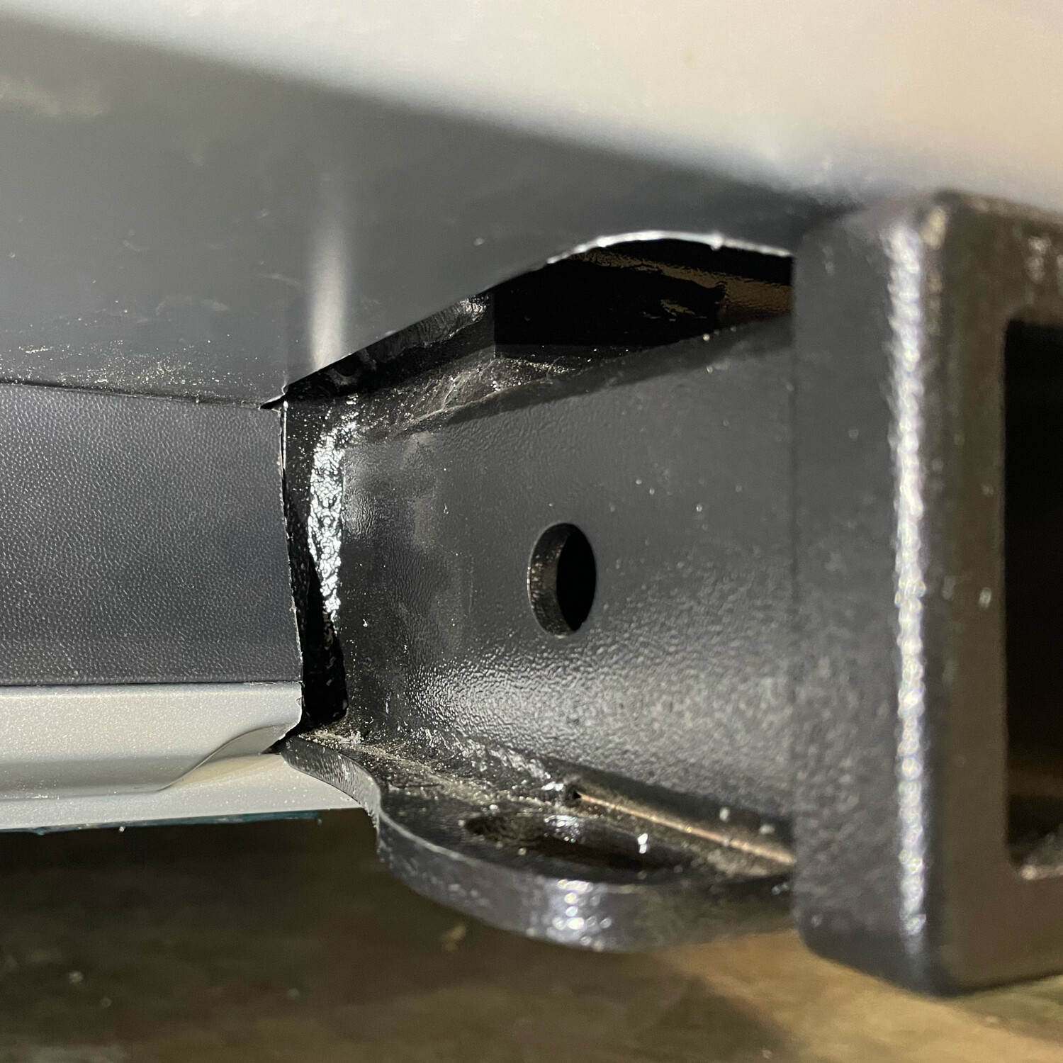 The aftermarket hitch would not fit without some trimming of the fascia. I think I ended up with a pretty clean fit!