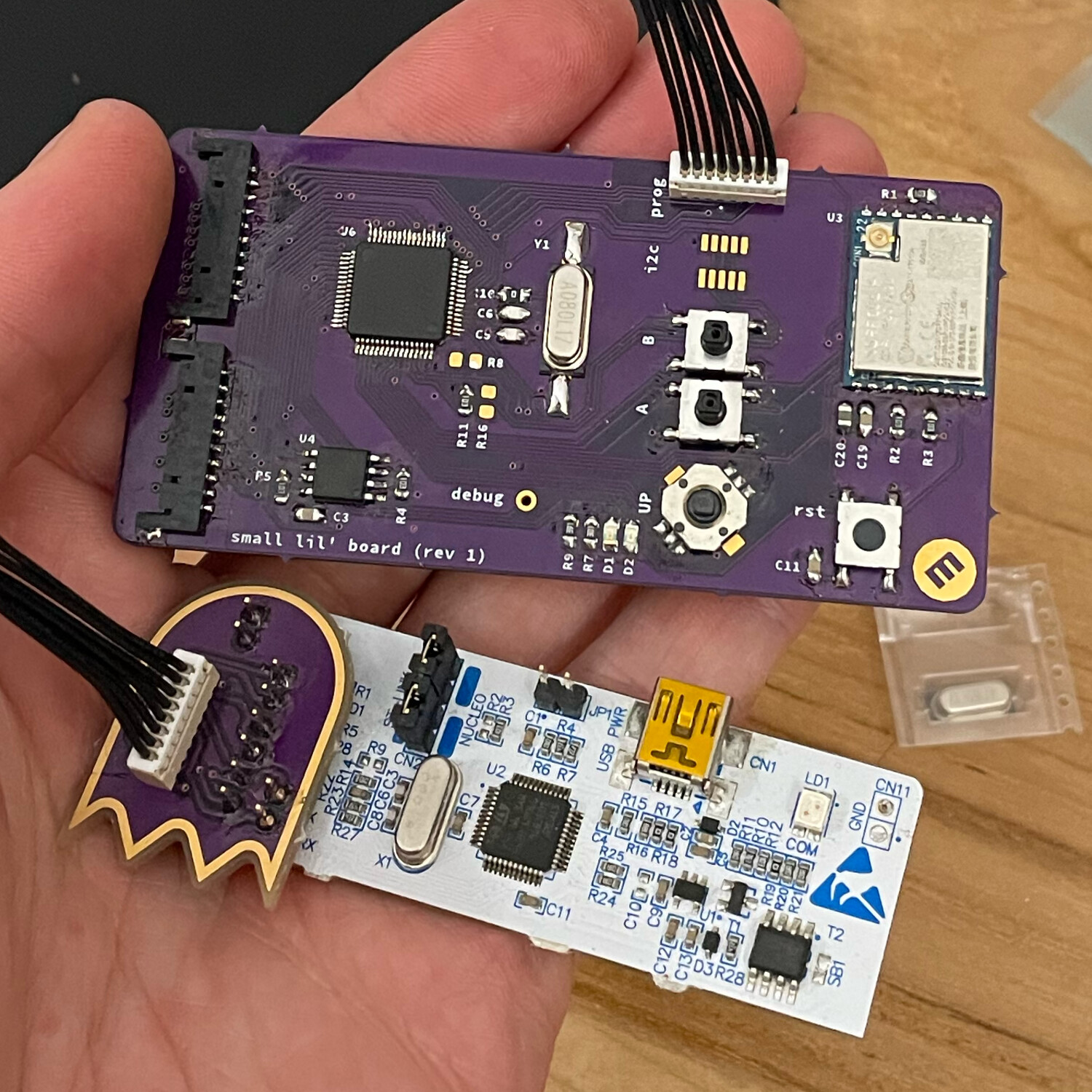 An assembled retrofit "driver driver" board, using an adapter which repurposes the STM32 Nucleo as a programmer.