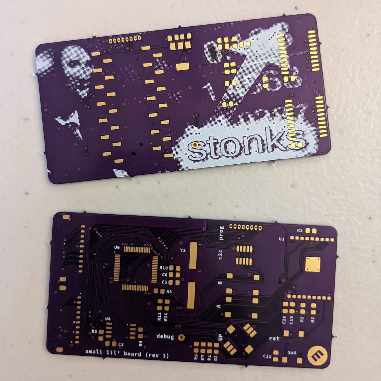 After validating the hardware and software, I designed a "driver driver" board. I originally was going to use the screen as a stocks ticker, which should explain the silkscreen!