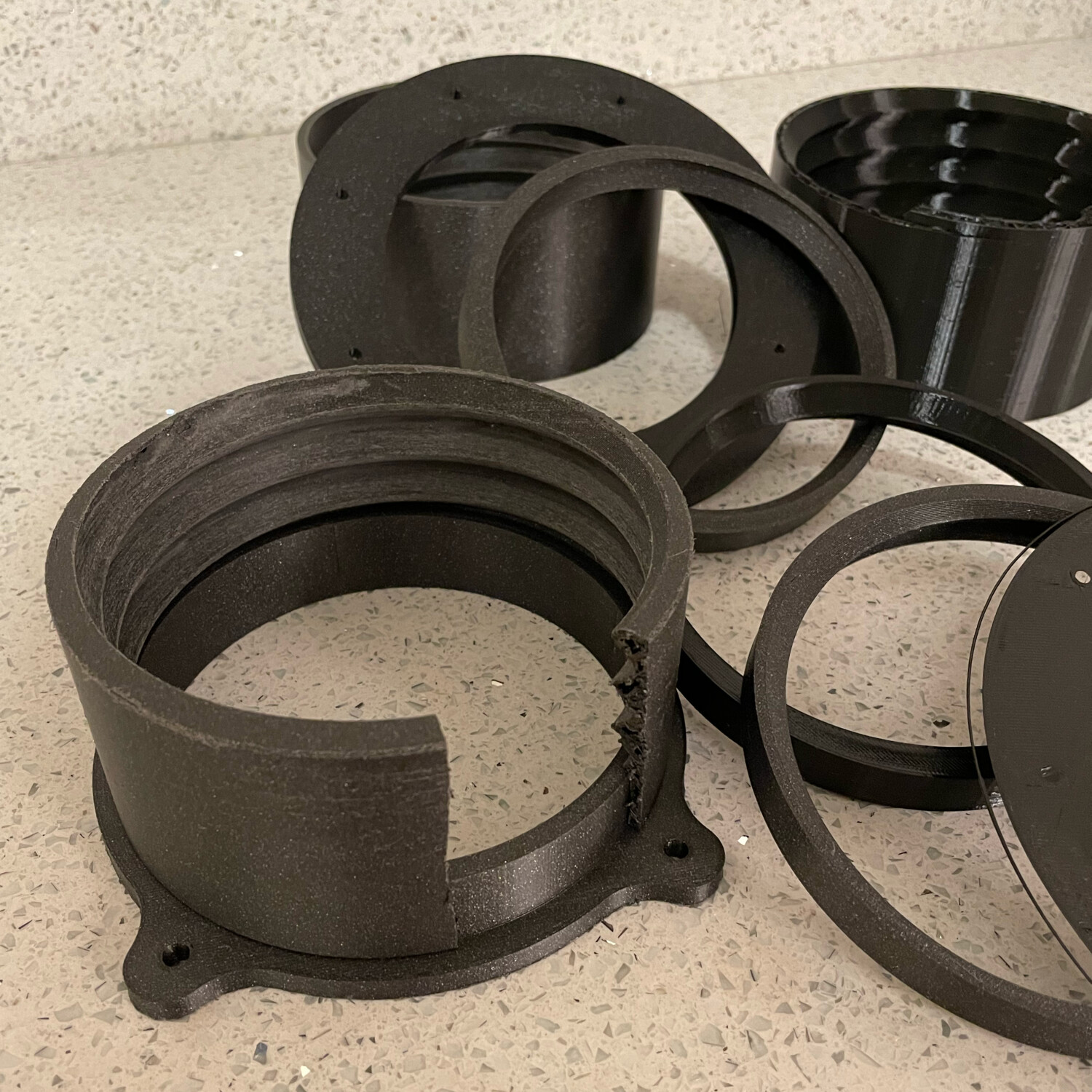 Without a specification for the AC hose size, and with no easy way to measure the size of the hose "thread," it took a few prototypes to get something that fit nicely.